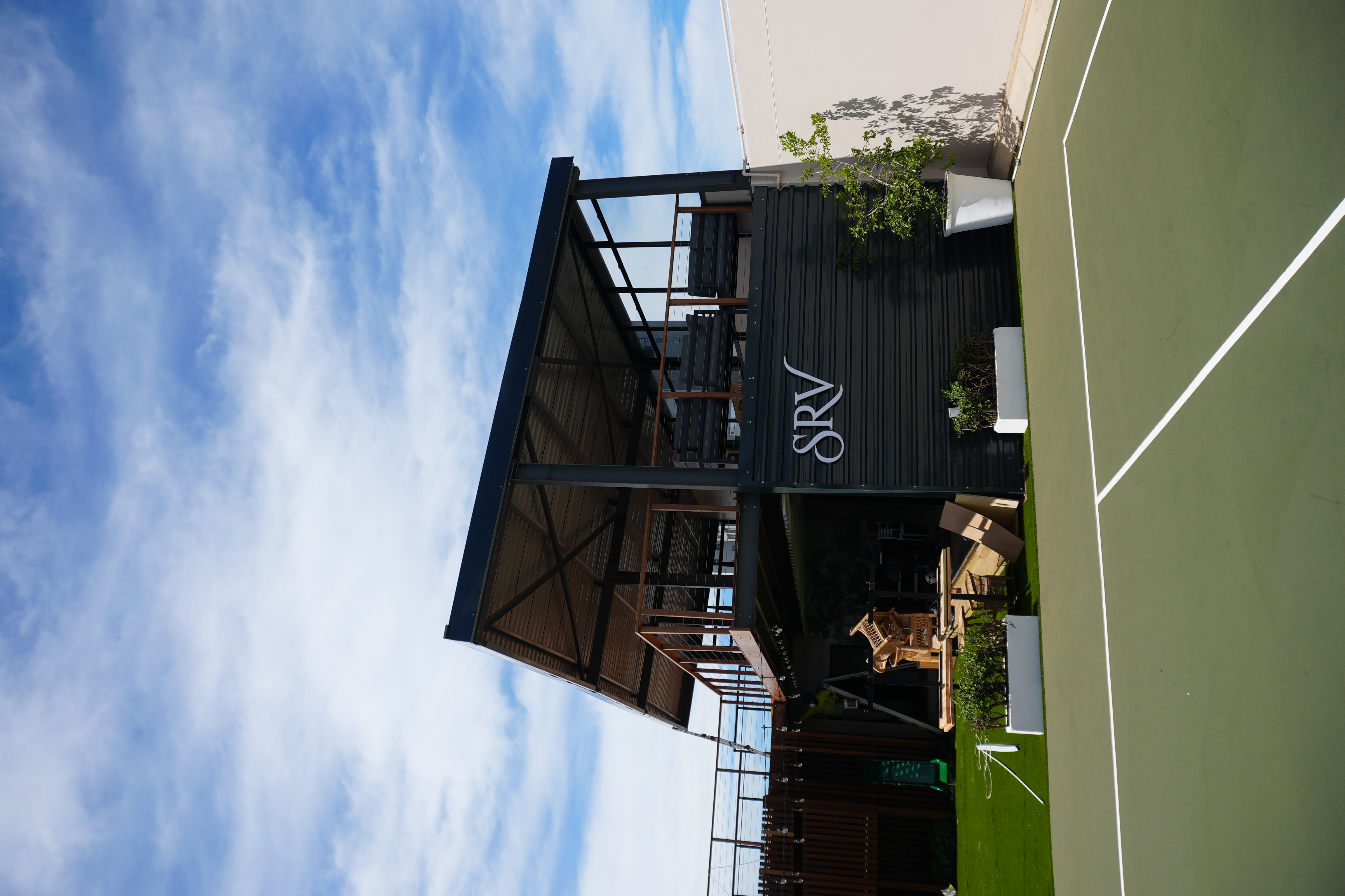 Outdoor terrace dining area at SERVE